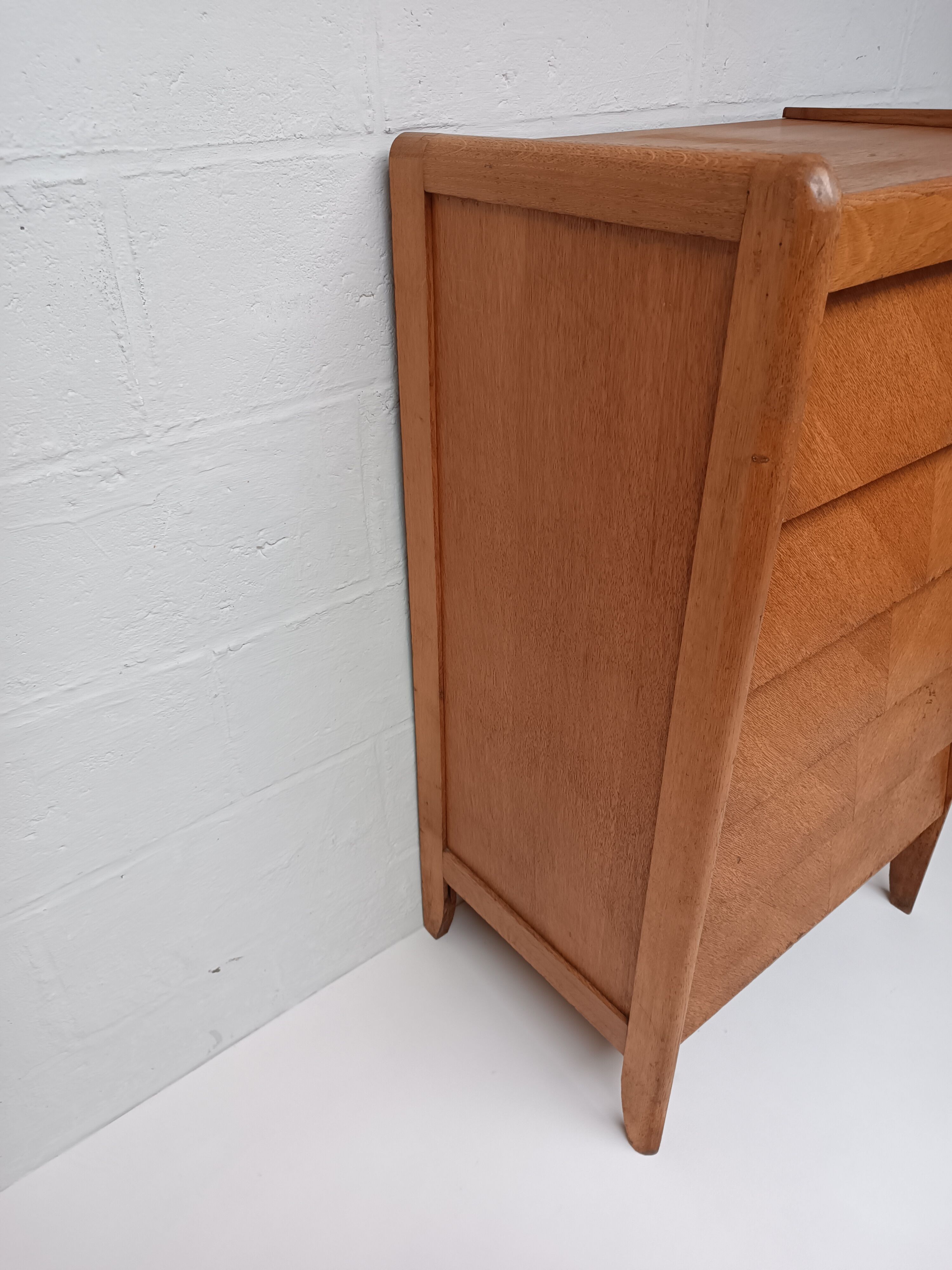 High wooden chest of drawers in the 50s
