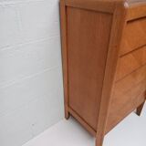 High wooden chest of drawers in the 50s