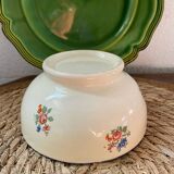 Flowery bowl with blue edging.