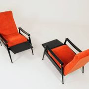 Pair of vintage armchairs in burnt orange, MCM design from the 1960s.