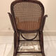 Vintage rocking chair for children in dark rattan and canework, rocking chair