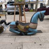 Carved wooden rocking horse