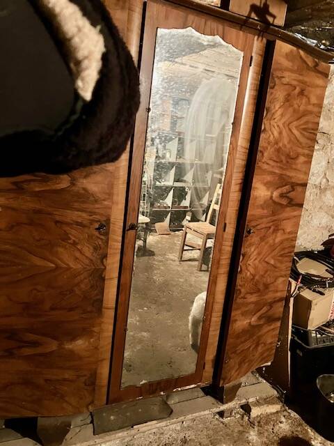 Old black marble chest of drawers