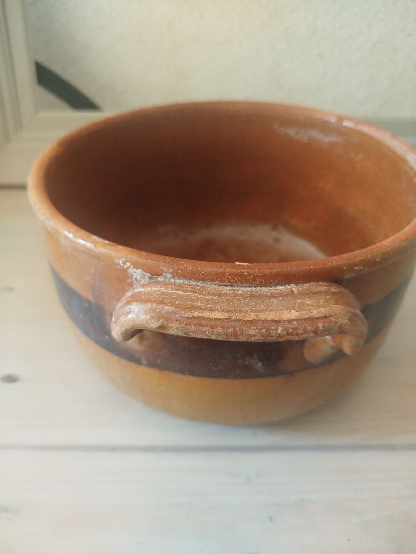 Old terracotta casserole