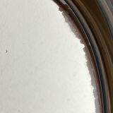 Circular mirror, smoked plastic, 1960s/70s.