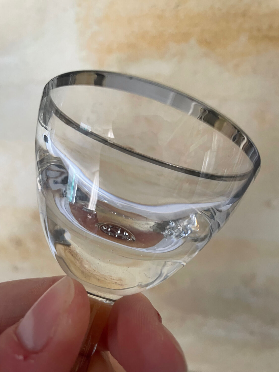 Set of 8 stemmed port glasses with silver trim.