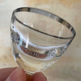 Set of 8 stemmed port glasses with silver trim.