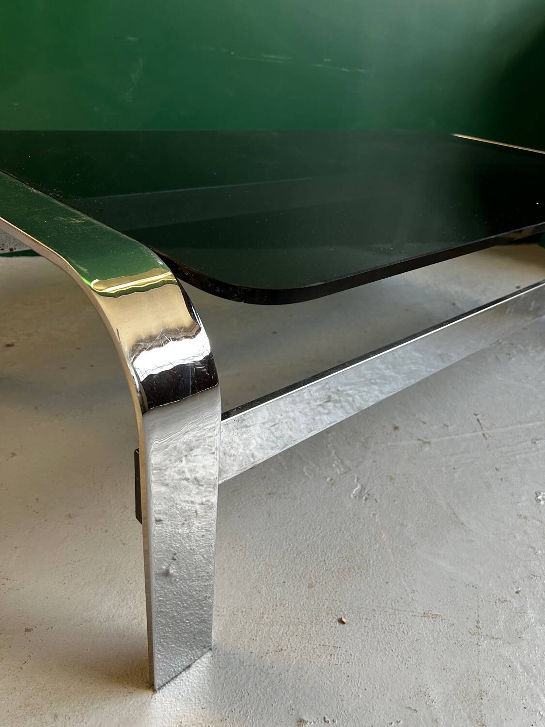 Coffee table in chromed metal and smoked glass