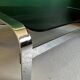 Coffee table in chromed metal and smoked glass
