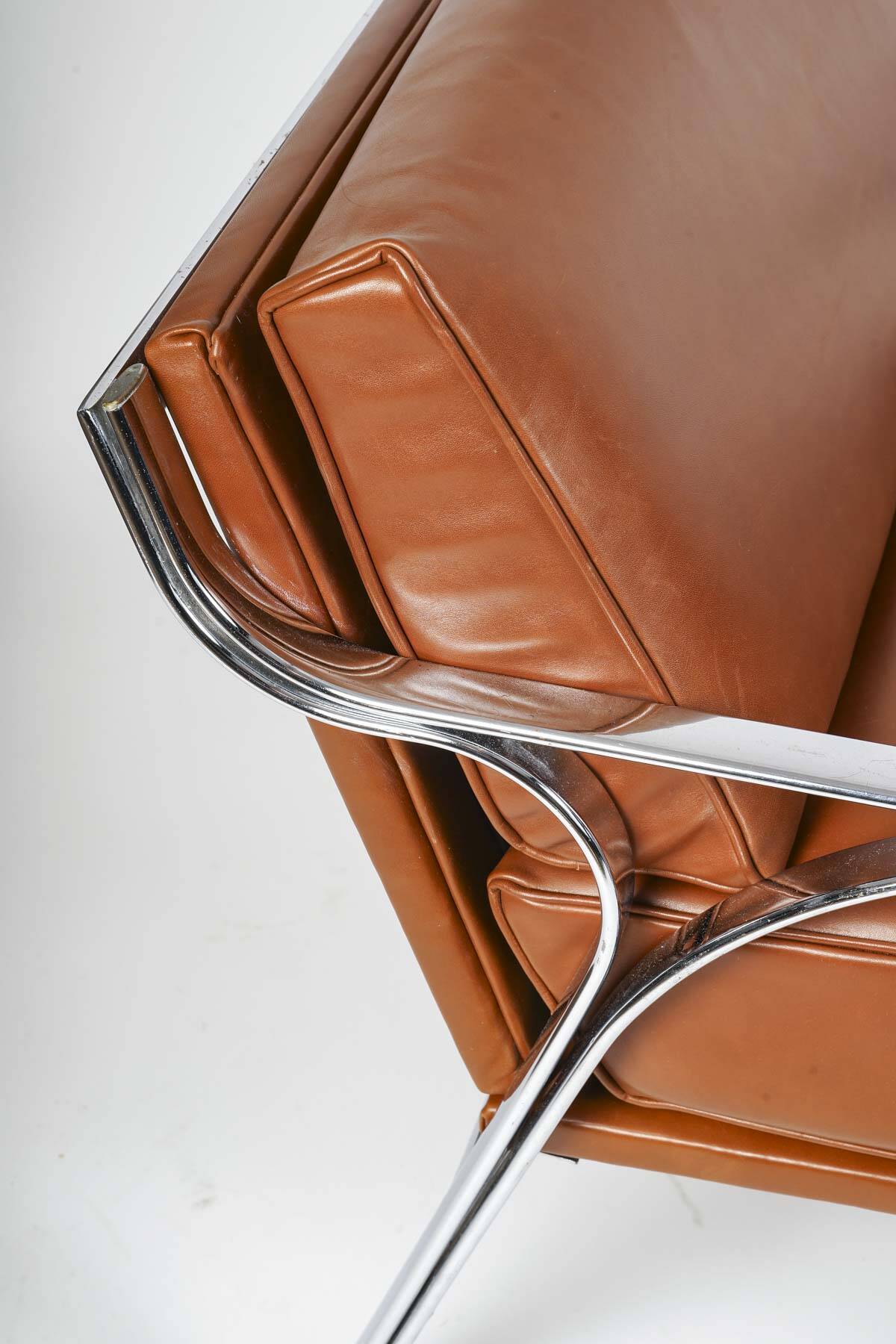 Pair of metal and leather armchairs from the 60s