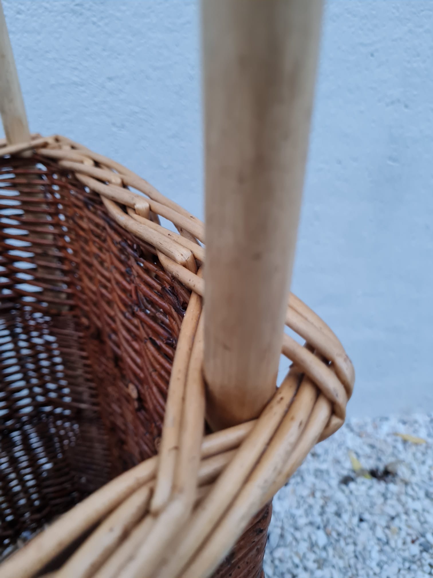 Vintage wicker log basket on vintage wheels