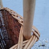 Vintage wicker log basket on vintage wheels