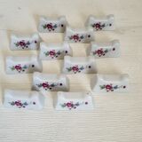 Set of 12 porcelain knife holders with flowers