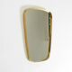 A pair of rare Mid Century "Münchener Zierspiegel" brass wall mirrors
