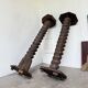 Pair of pedestal columns with oak pressing screws, 1900