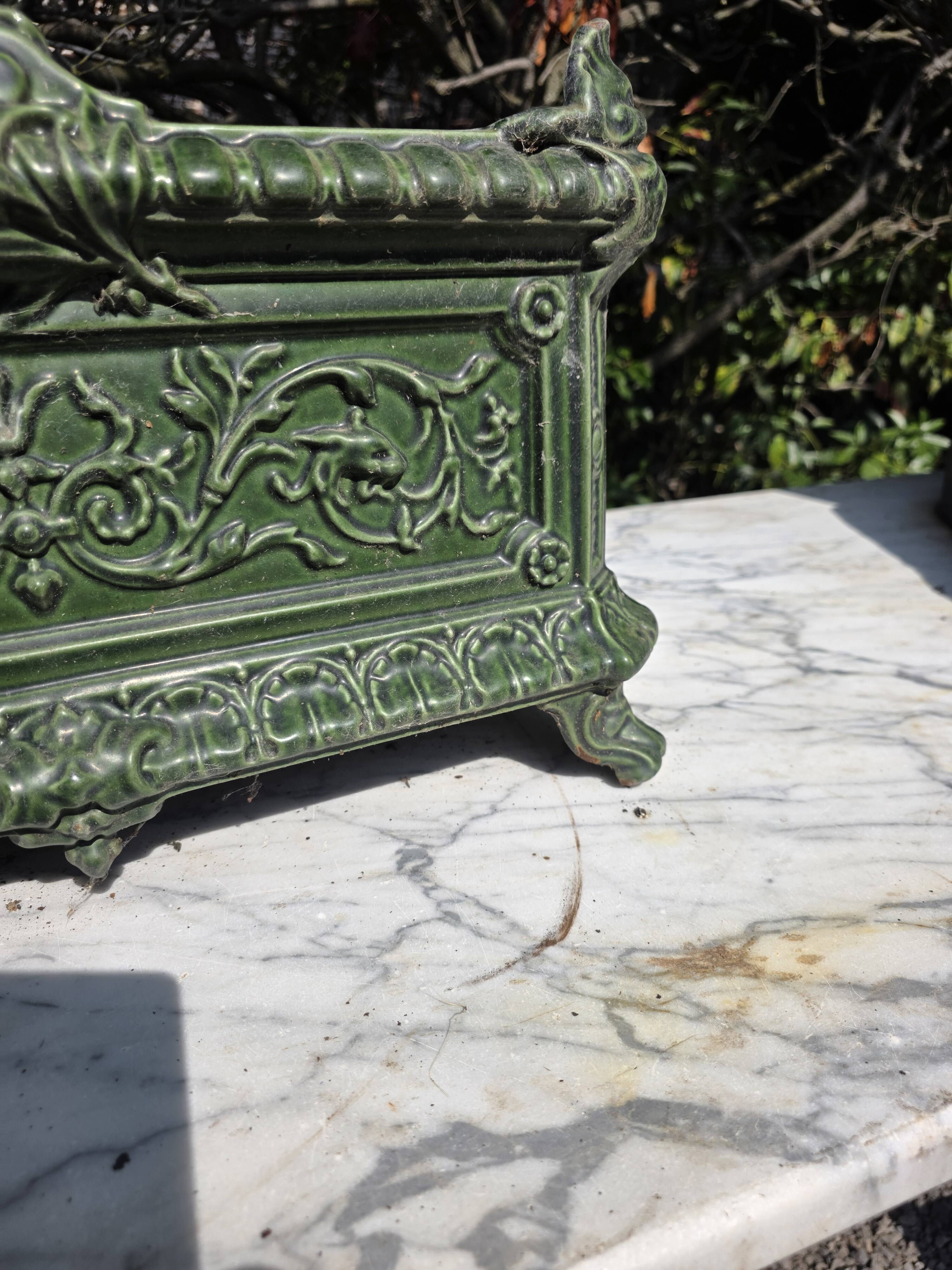 Antique enamelled cast iron planter in the Napoleon III style.