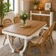Restored oak table in natural wood and linen.