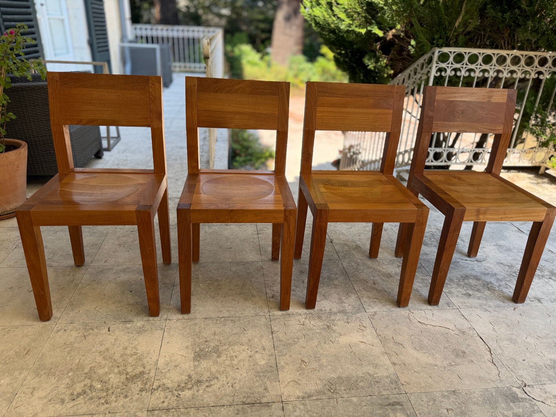 Set of 4 Ethnicraft teak chairs