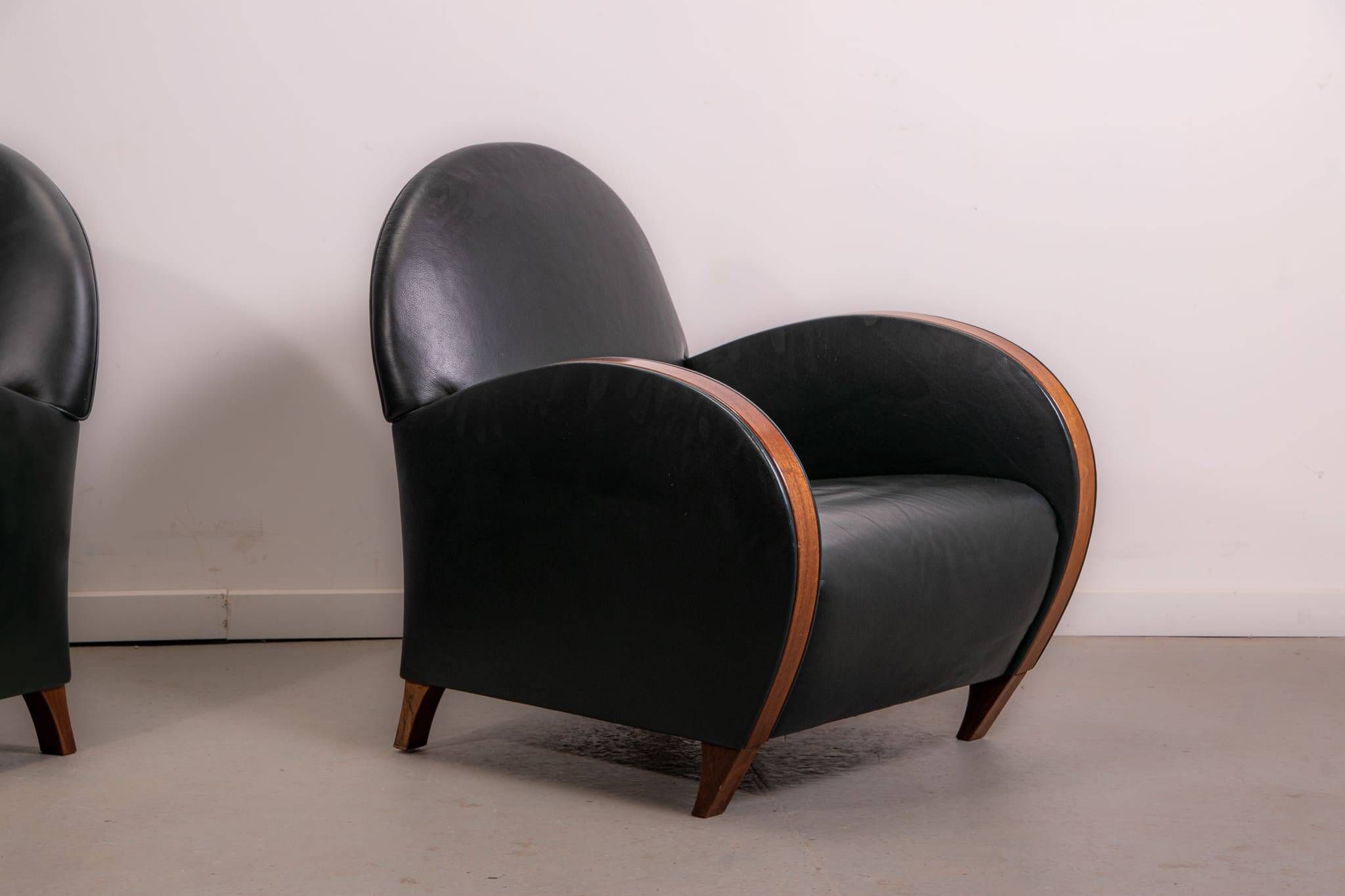 Pair of mid-century leather armchairs, circa 1970, made in Belgium.