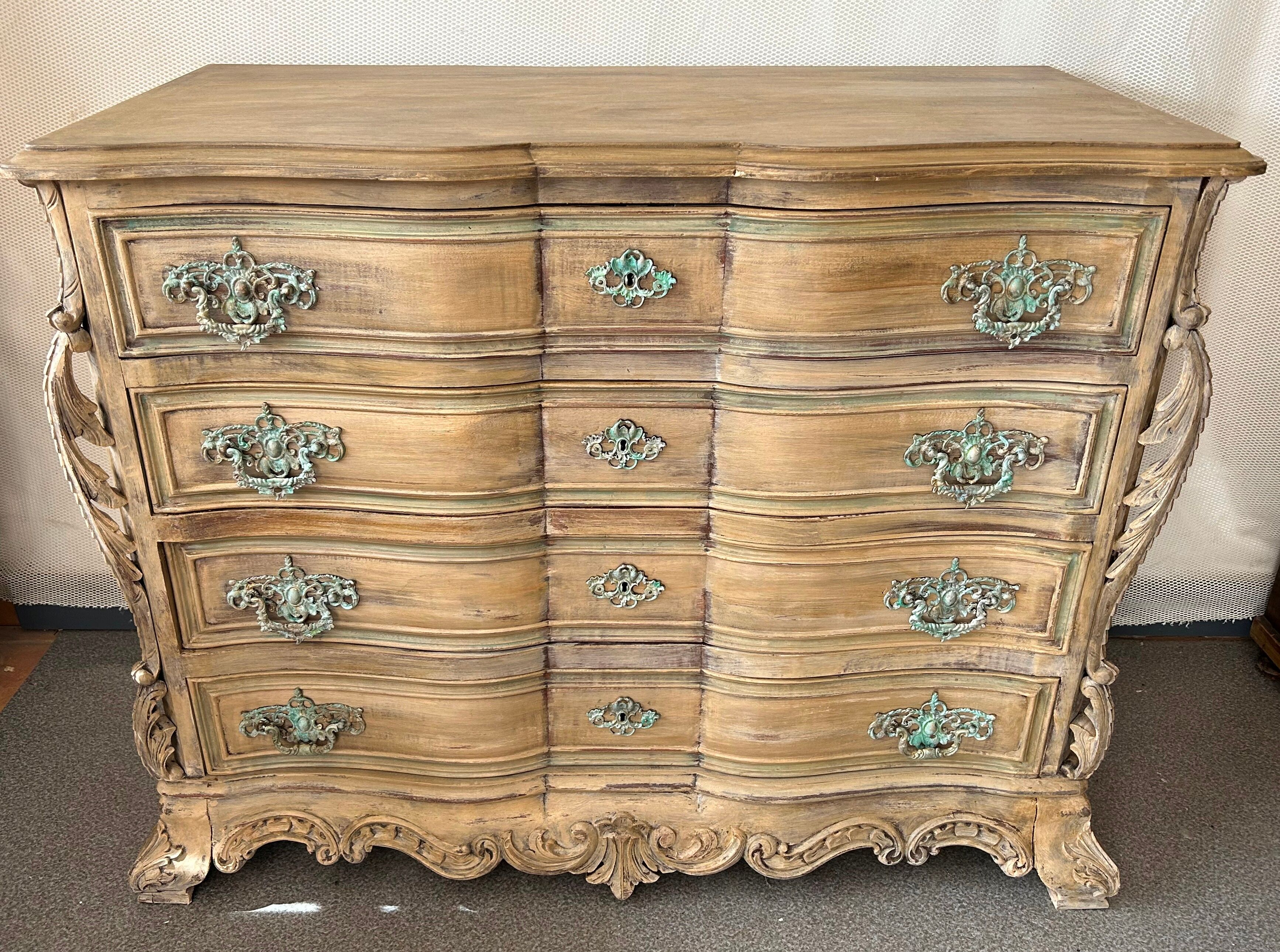 Patinated baroque crossbow chest of drawers
