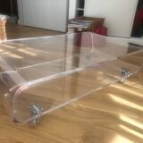 Habitat plexiglass coffee table on wheels