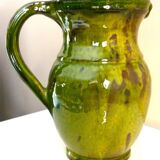 Pitcher vase, thick green glazed terracotta, signature to be identified