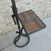 Lampadaire en fer forgé avec tablette en grès décor herbier, années 60