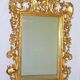 Imposant Miroir, bois sculpté doré, à décor de Putto