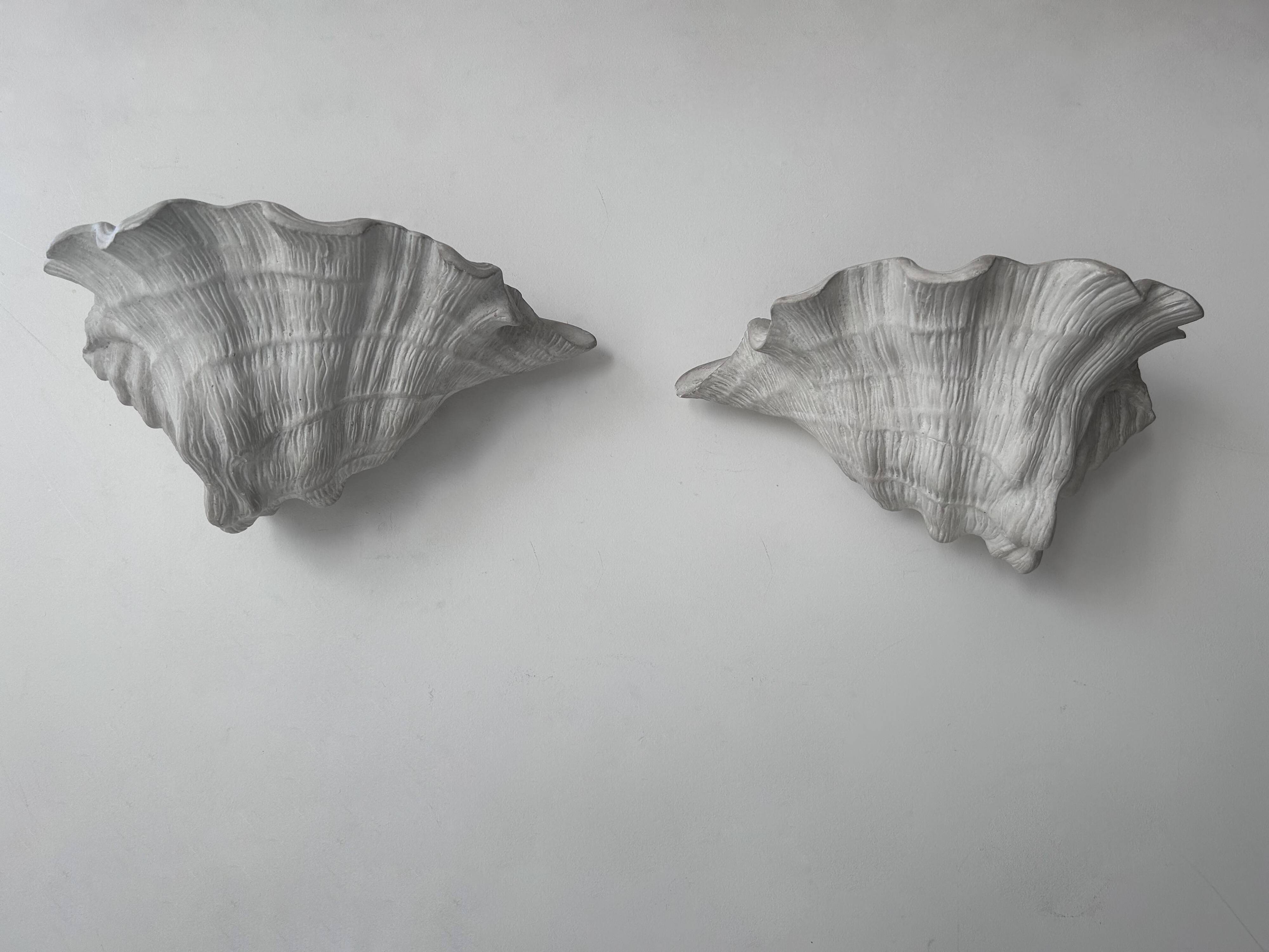 Pair of vintage shell wall lights, matte white plaster, France 1940