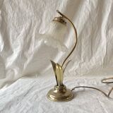Old brass accent lamp in the shape of a flower