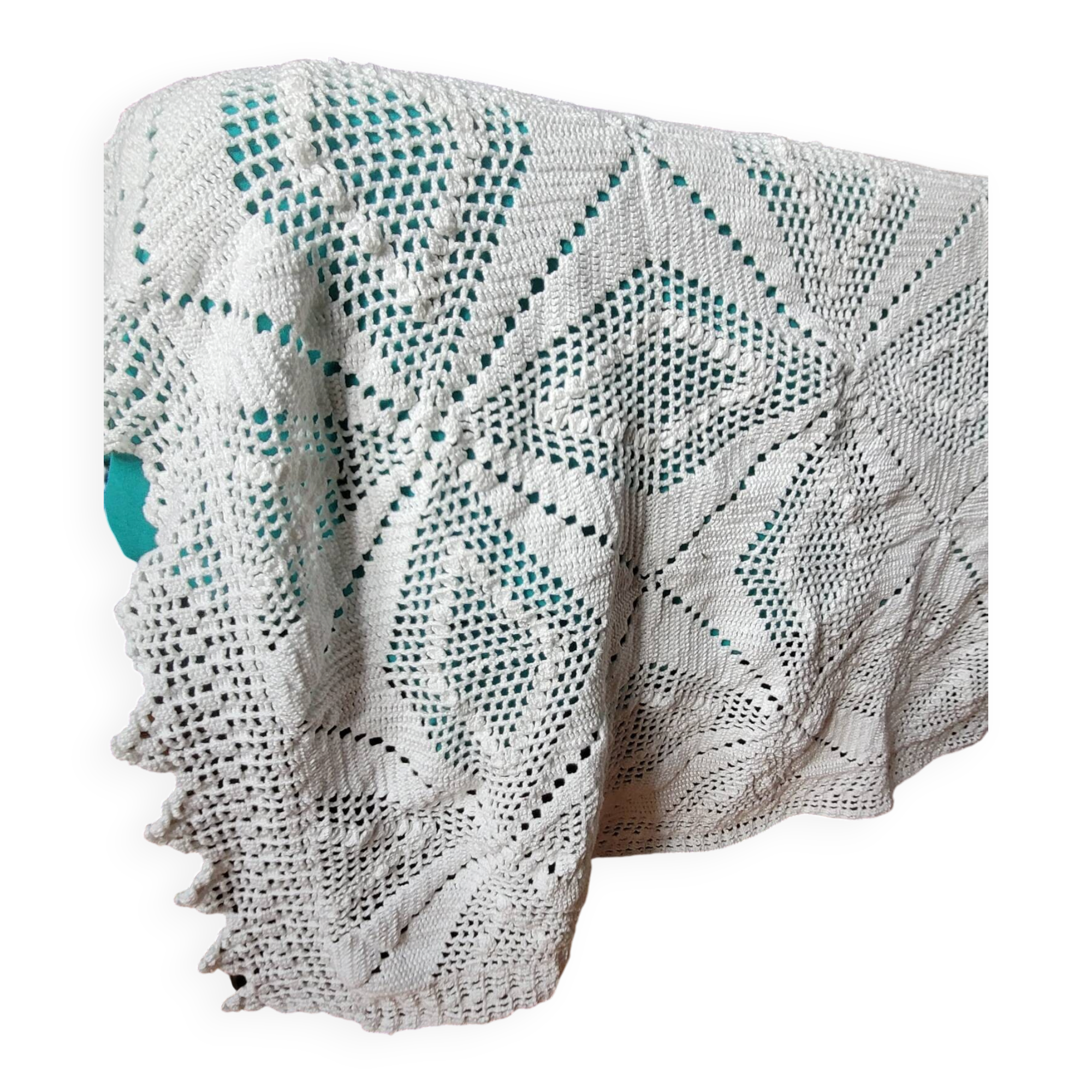 Large white crocheted bedspread