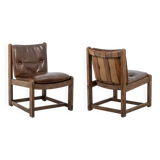 Pair of oak armchairs, upholstered in leather. Work from the 1960s.