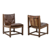 Pair of oak armchairs, upholstered in leather. Work from the 1960s.