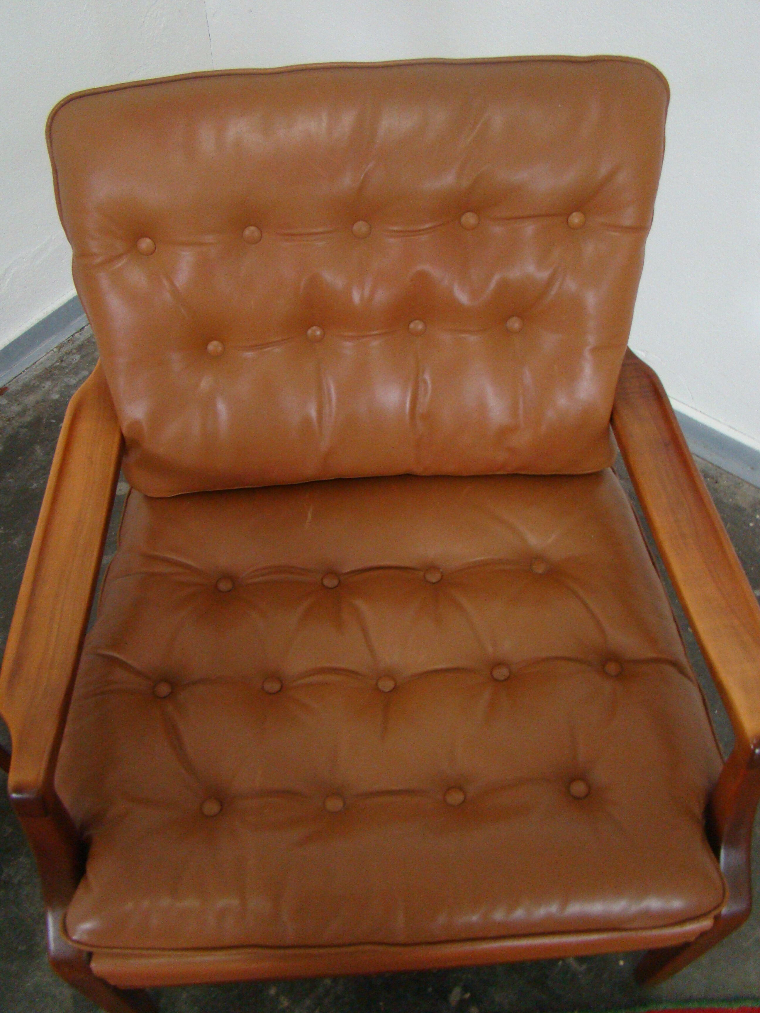 Fauteuil chesterfield en cuir vintage