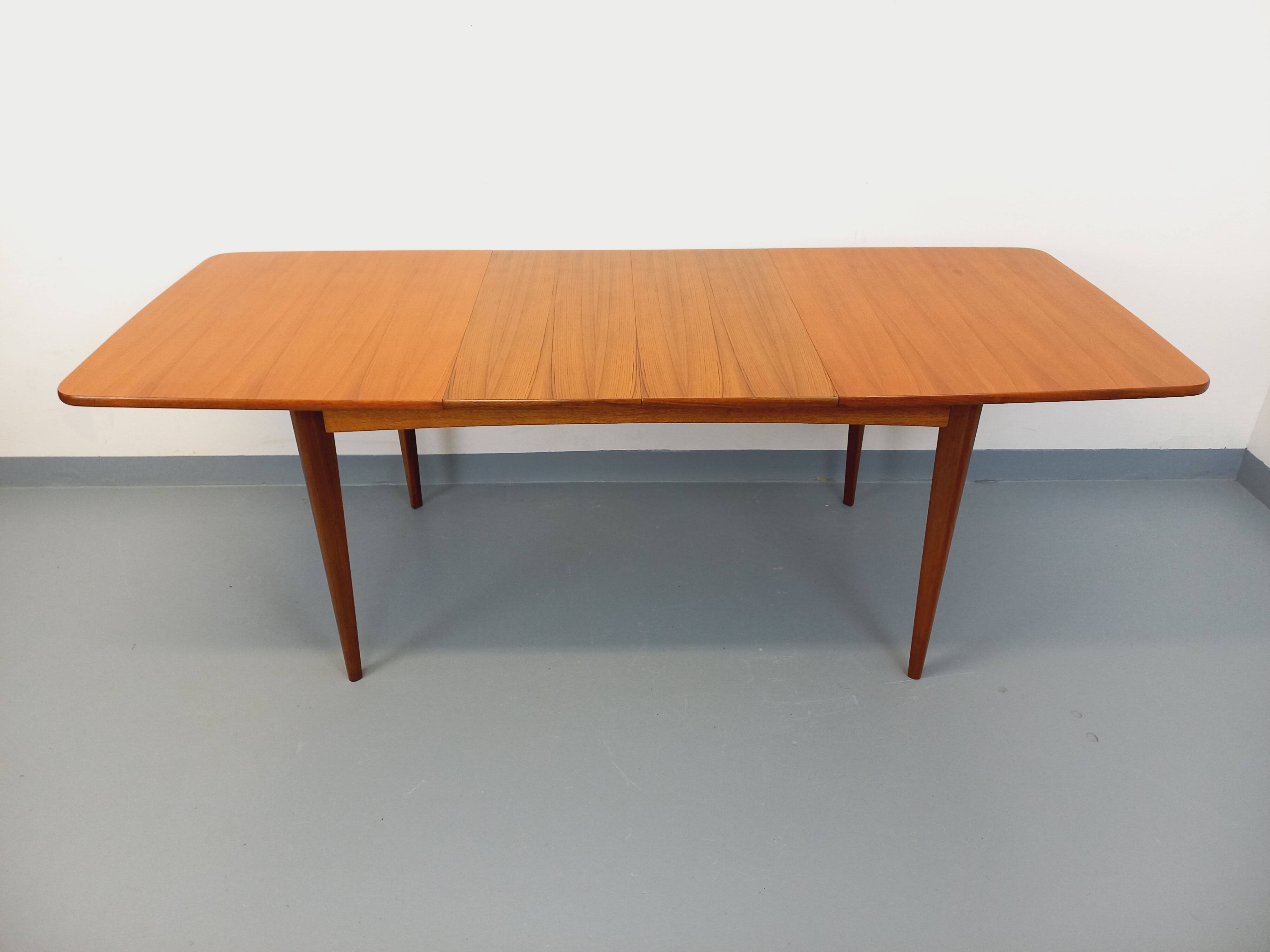 Rectangular dining table in vintage Scandinavian style from the 50s and 60s, made of teak.