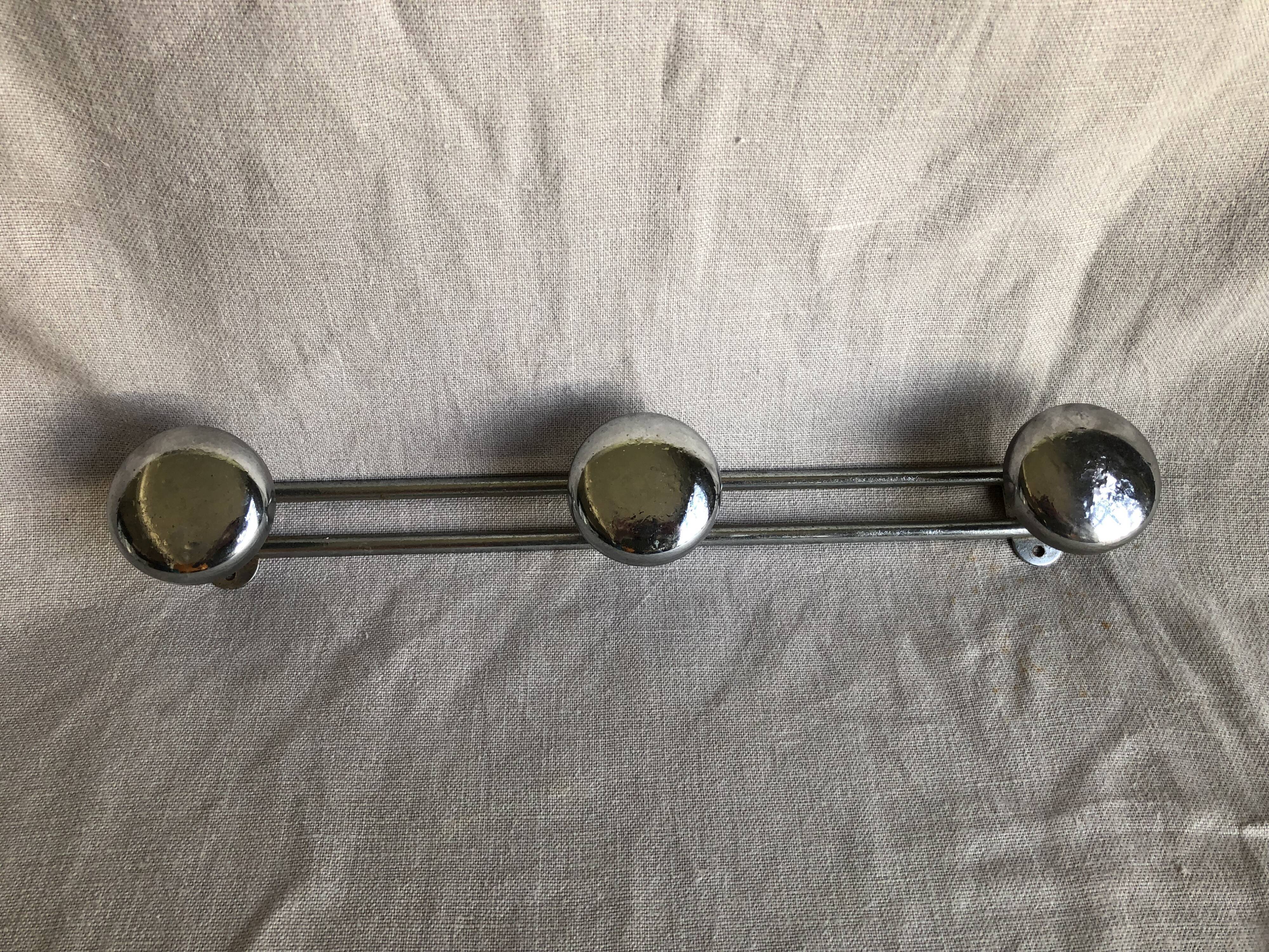 Metal wall coat rack