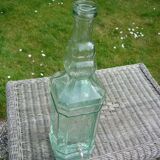 Square bottle of molded-pressed glass with faucet
