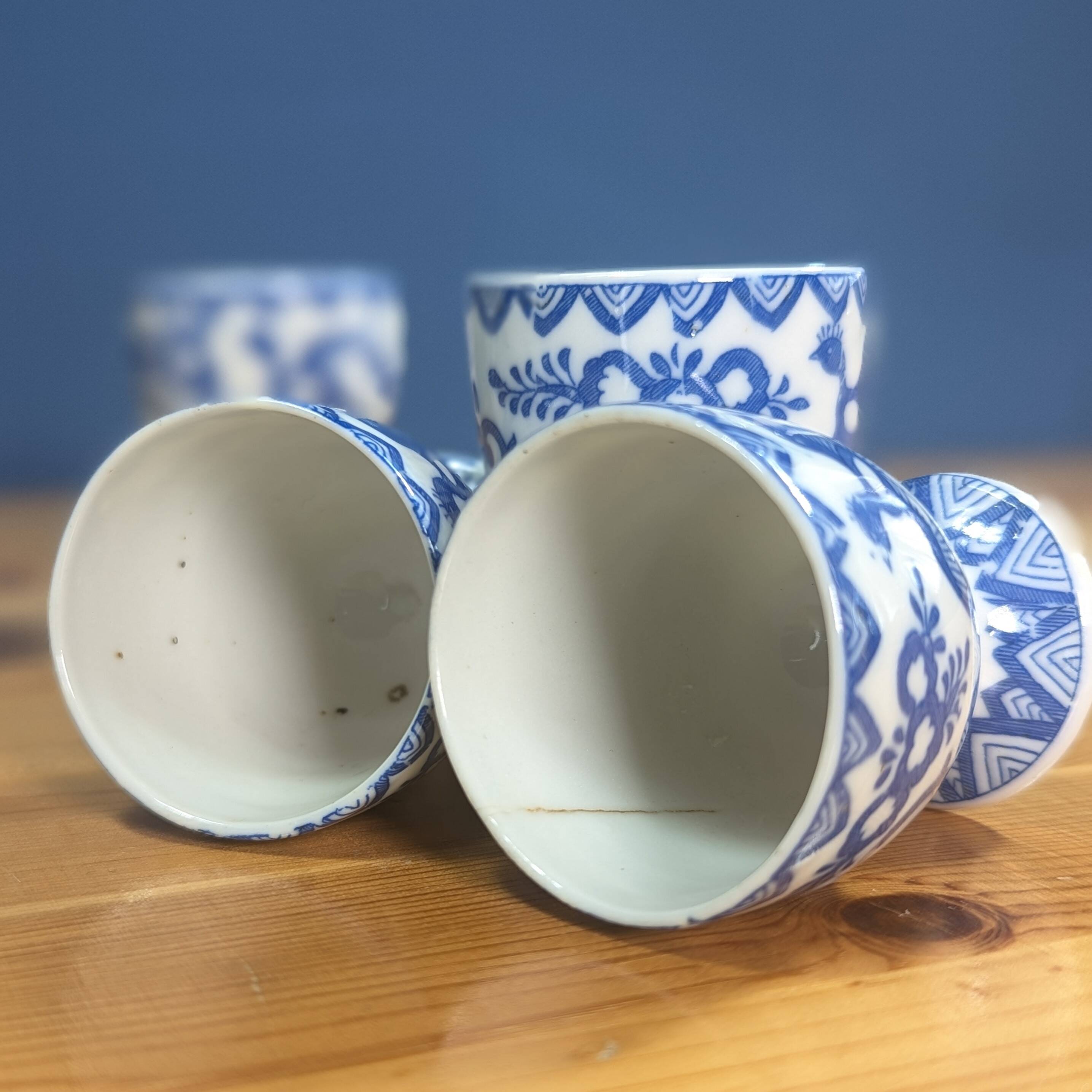 6 Japanese porcelain egg cups signed with blue bird flower geometry patterns
