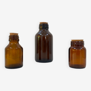 Trio of apothecary bottles