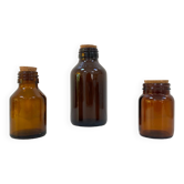 Trio of apothecary bottles
