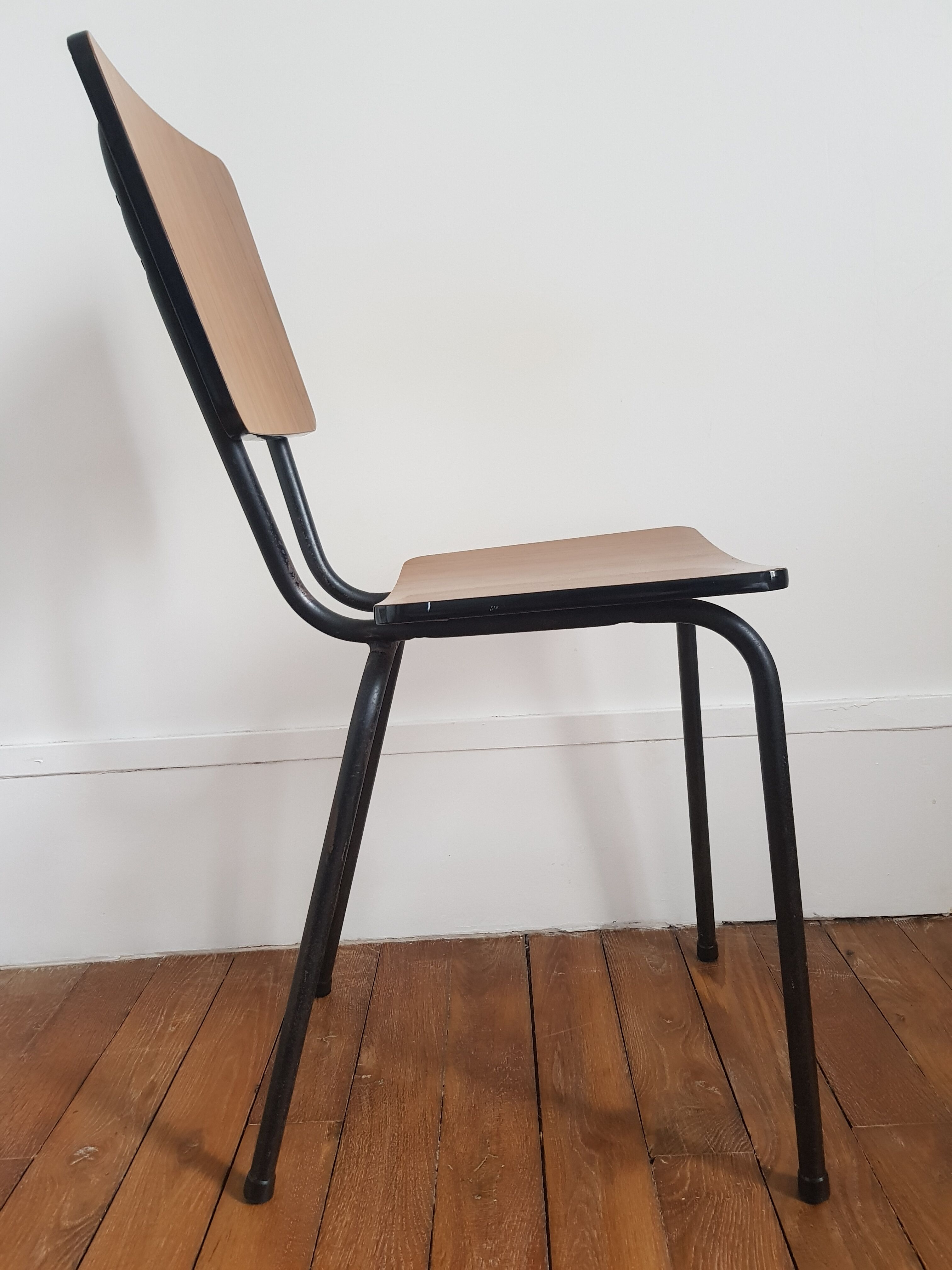 Brown formica chair with black structure