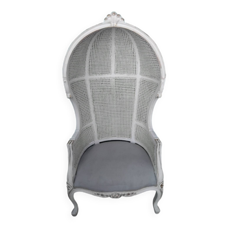 Fauteuil portier vintage en rotin