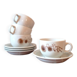 Four large cups and their tea service cups