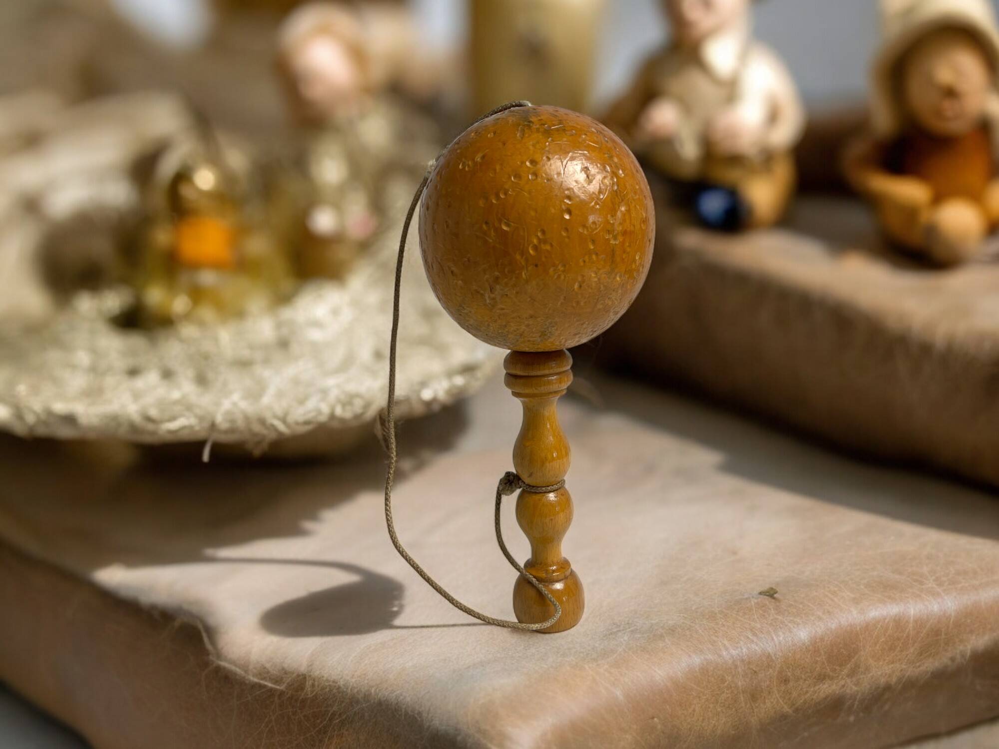 Old bilboquet toy in varnished wood 20th century