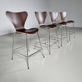 Set of 4 brown oak plywood bar stools by Fritz Hansen Series 7 by Arne Jacobsen.
