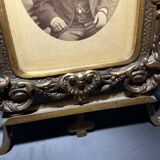 Old photograph of a man in a spelter frame