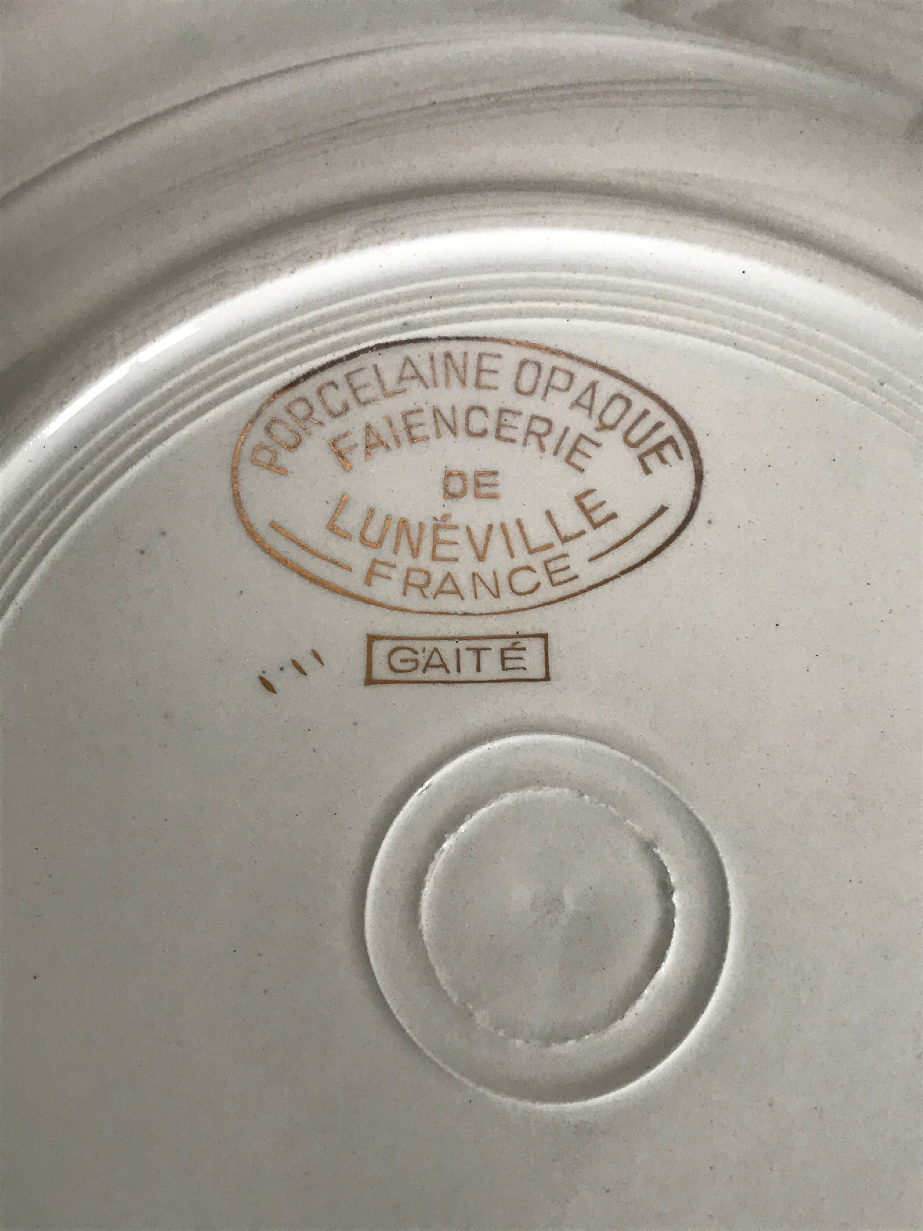 Set of 9 Lunéville hollow plates