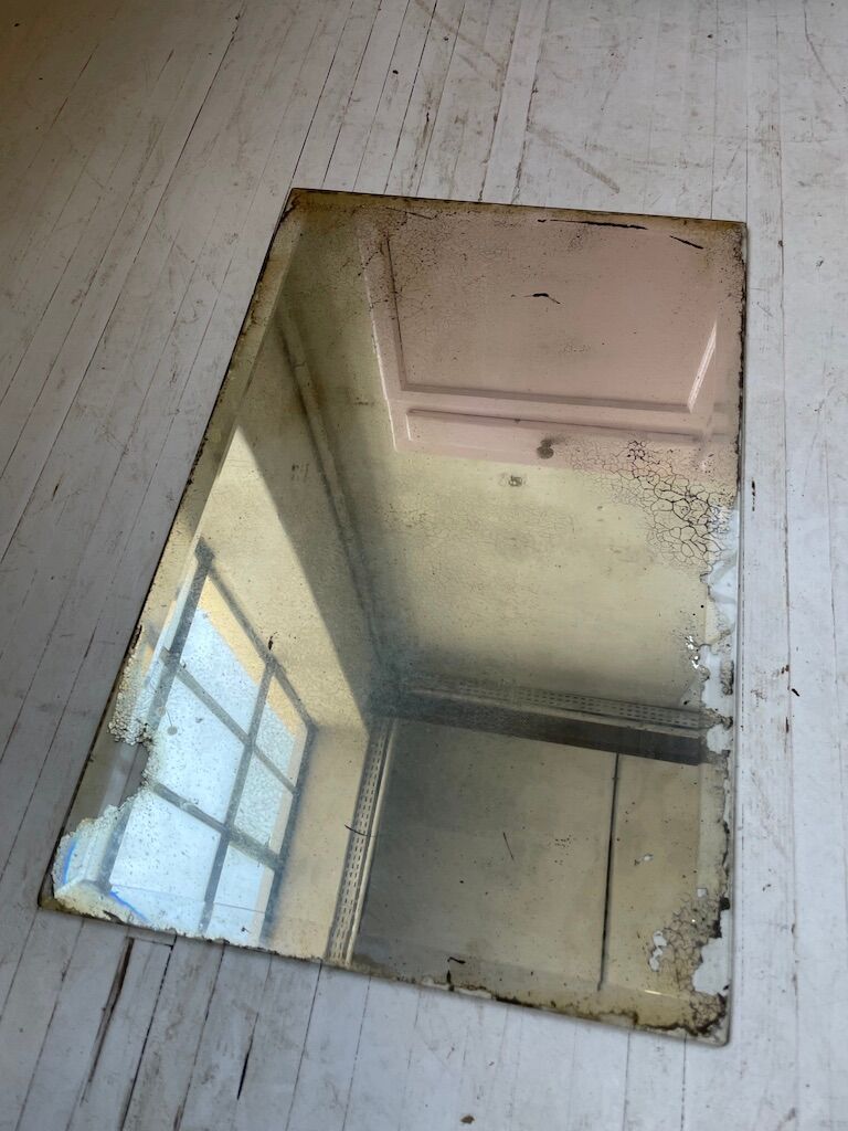 Very stung old bevelled mirror 39x60cm
