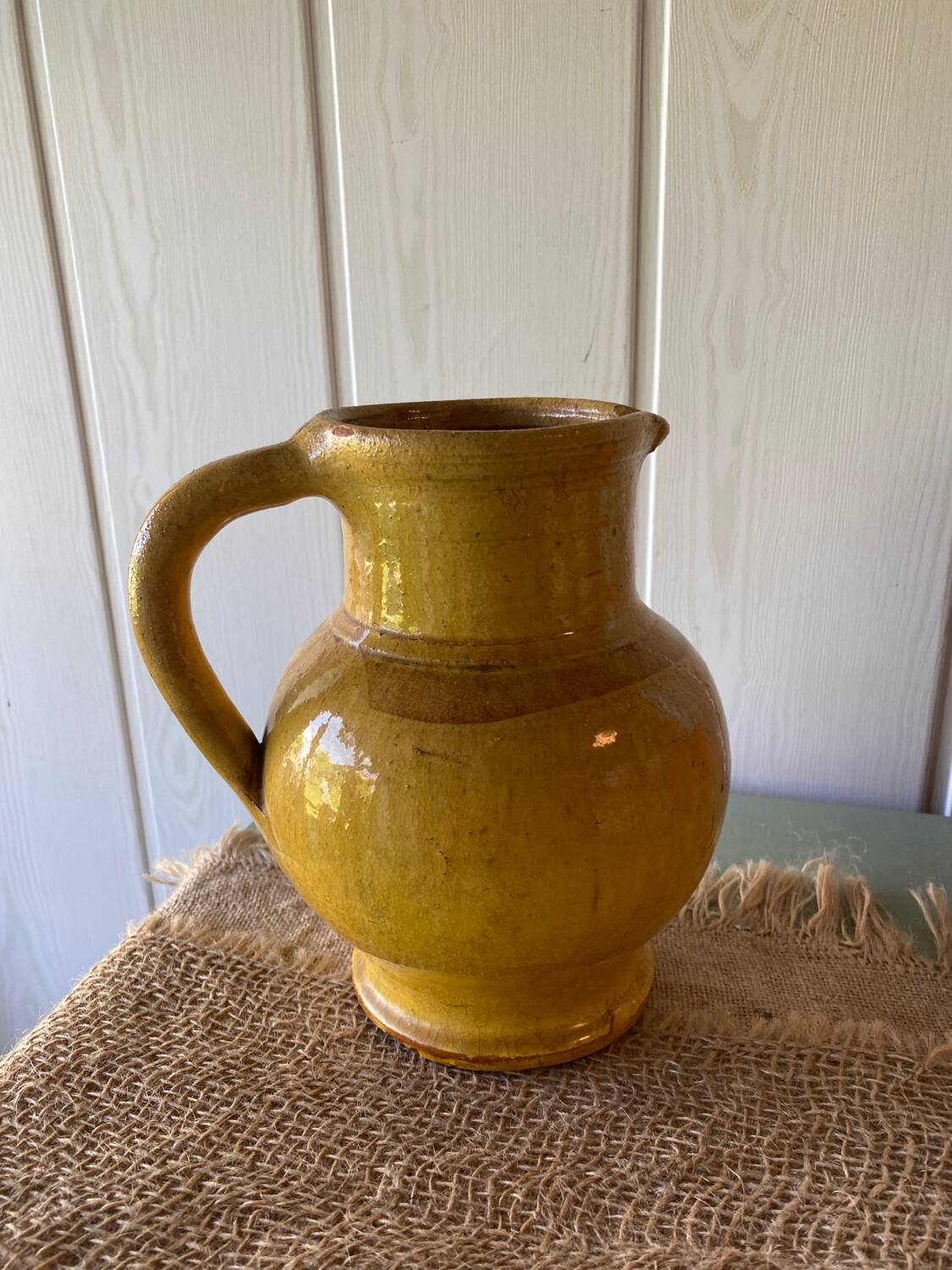 Yellow terracotta carafe