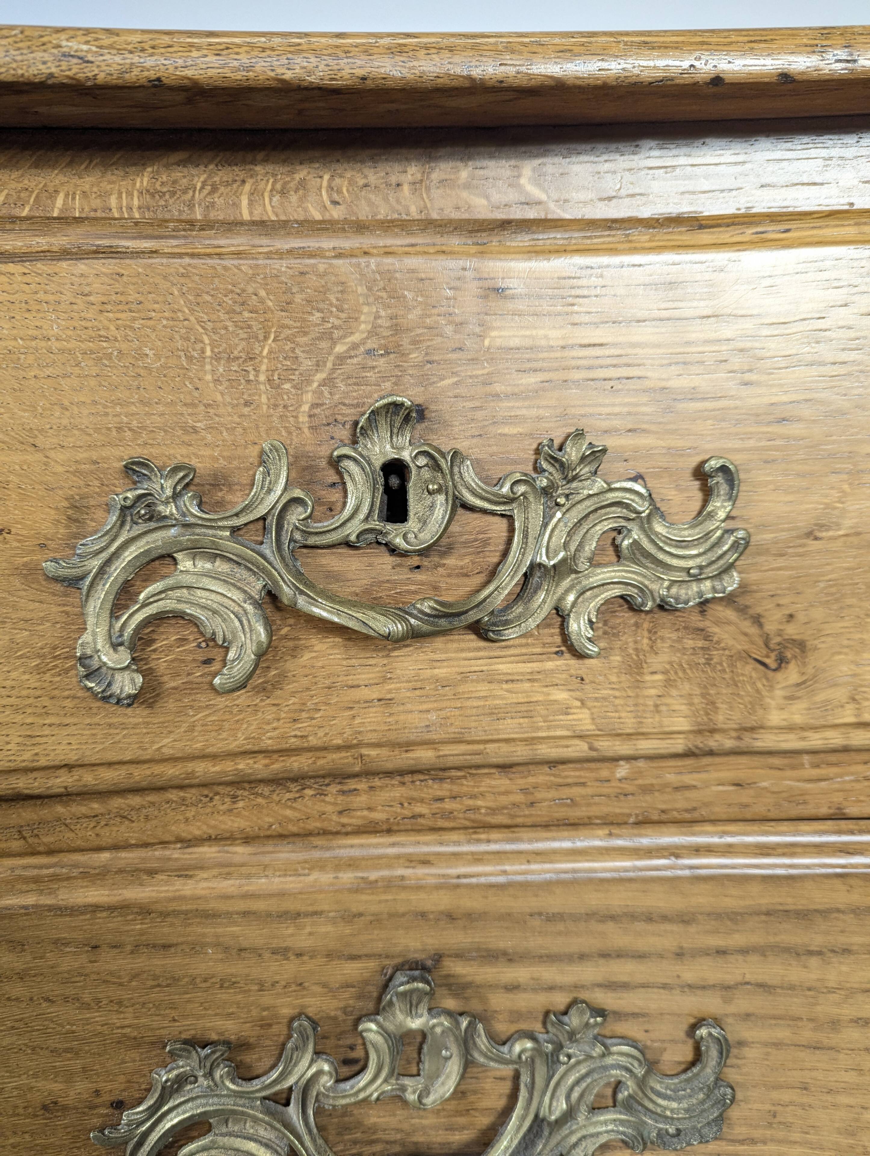 Louis XV period chest of drawers in light oak